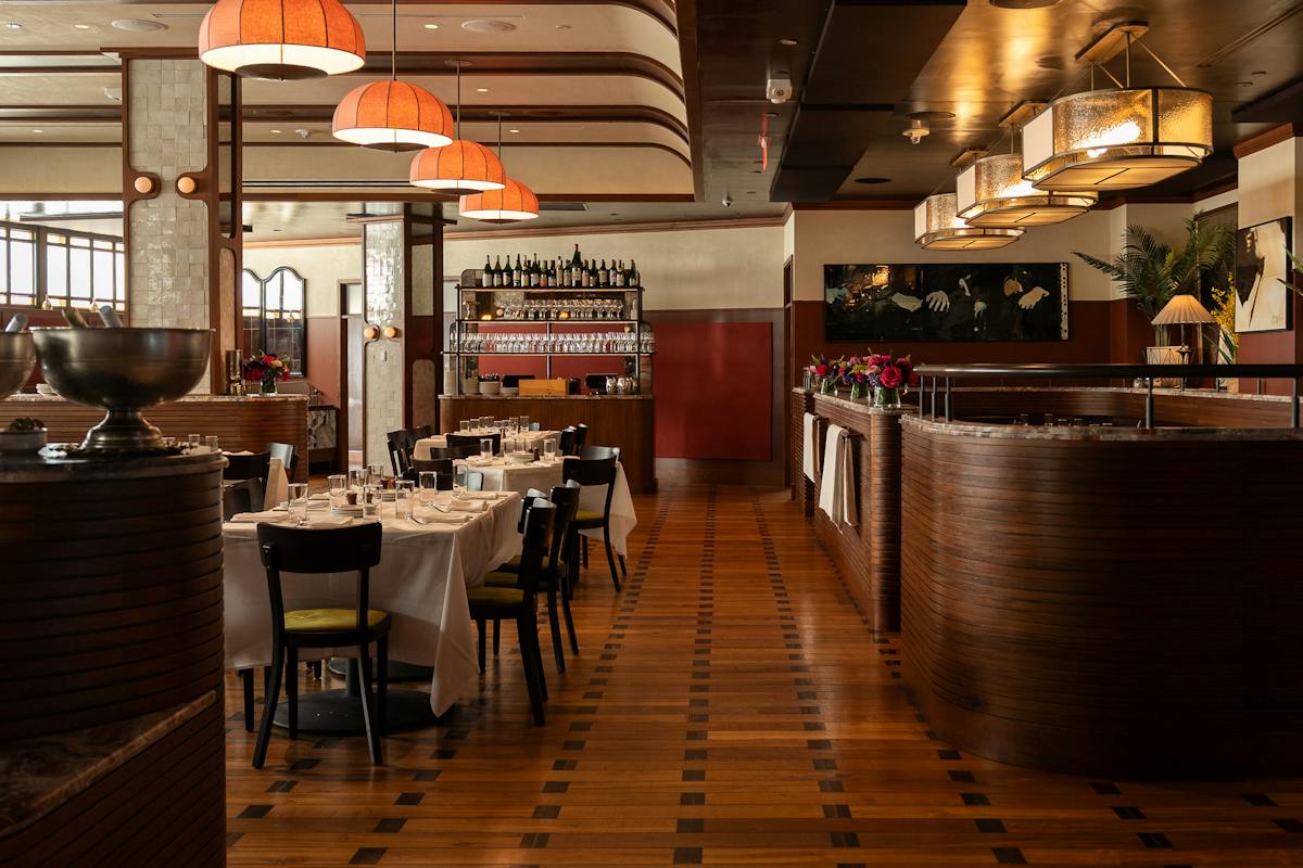 a restaurant with tables and chairs
