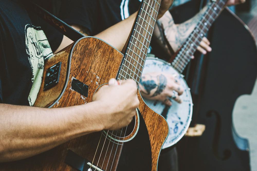 a man holding a guitar
