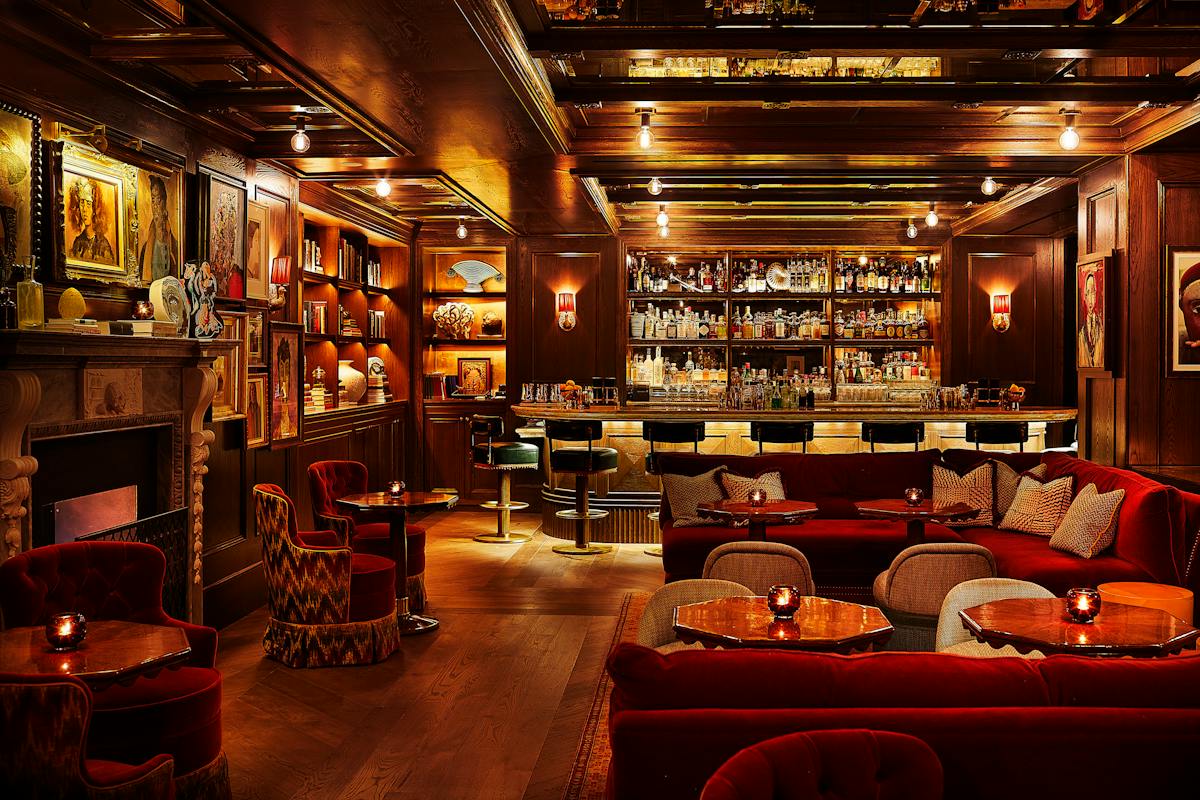 a room with a couch and table in a restaurant